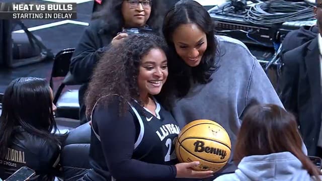 A'ja Wilson Gifts Signed Ball to Aces Fan While Attending the Bulls-Heat Game 