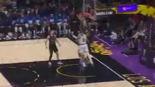Austin Reaves Combines With LeBron James for an Epic Alley-Oop Dunk