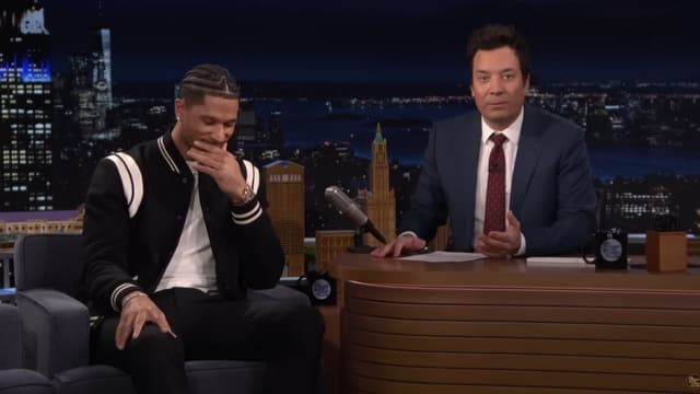 Josh Hart Explains His Viral Moment of Throwing His Kid to Mitchell Robinson on the Bench