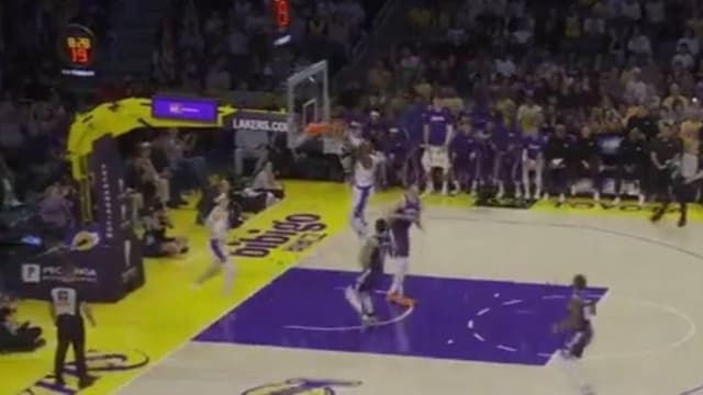 Austin Reaves Combines With LeBron James for the Alley-Oop Dunk in Chaotic Sequence