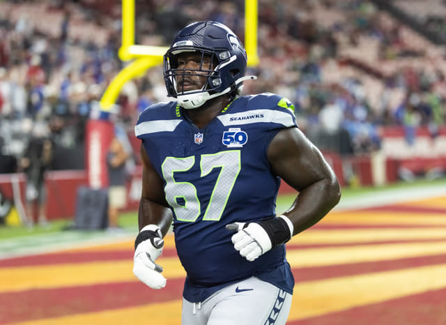 Charles Cross Leads NFL’s Highest-Paid OT List