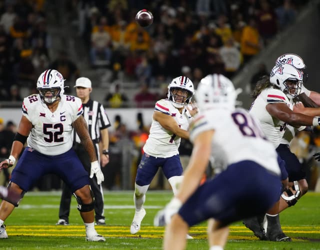 “Unhurt” Ref Takes a Double Hit From SMU, Arizona Players in Holiday Bowl