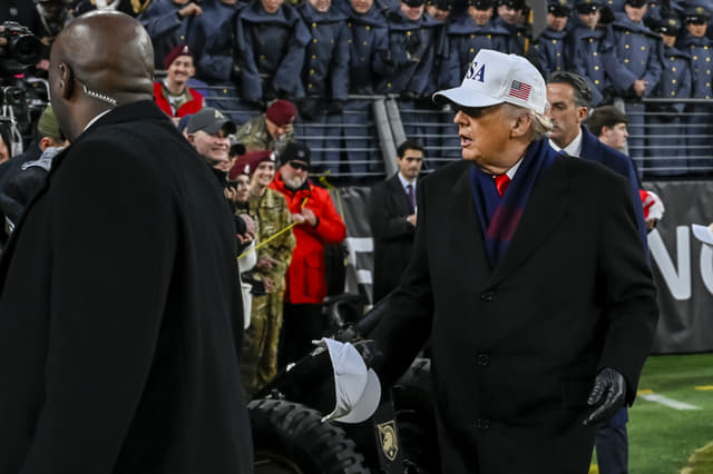 “Like His Golf Swing”: Fans Roast Donald Trump For Bizarre Coin Toss at Army-Navy Game