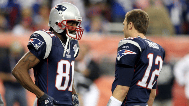 Randy Moss Says He Snuck Into Tom Brady’s Hotel to Join the Patriots