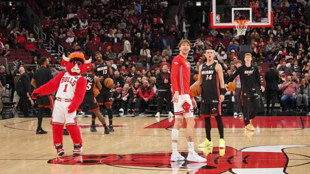 Benny The Bull Drains Backwards Half-Court Shot, Tyler Herro Refuses To Compete