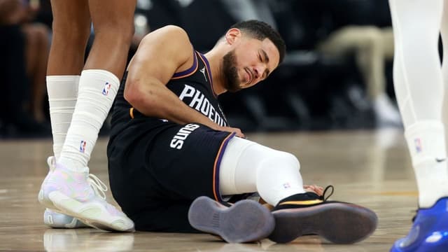 Devin Booker Limps Off Court During Suns-Heat After Awkward Landing