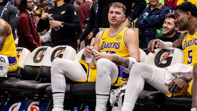 Luka Doncic Heads To Locker Room, Braces Lower Back