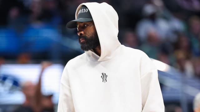 Kyrie Irving Responds To Mavs Fan Yelling At Him To Come Back Mid-Game