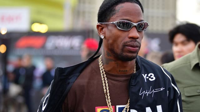 Travis Scott Goes Wild, Destroys Fanatics Sign During Pre-Super Bowl Show